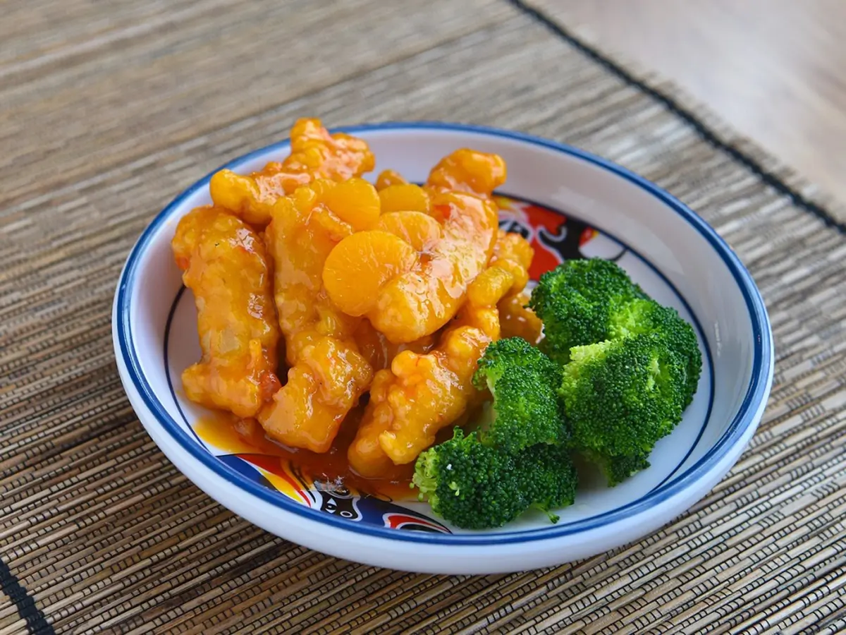 Classic Chinese sweet and sour chicken, featuring tender meat in a tangy red sauce at Jade Garden，a Chinese Restaurant in Creston